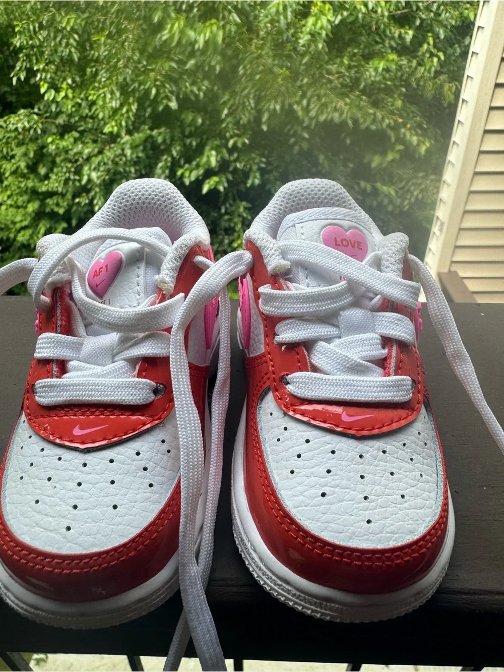 Nike Kids White Sneakers with Pink Swoosh and Orange Panels